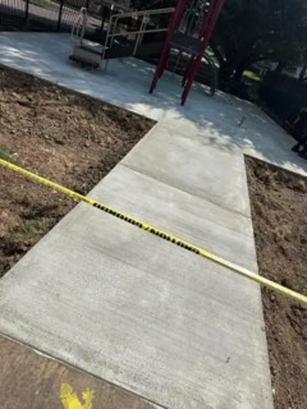 Finished walkway and steps poured at a playground