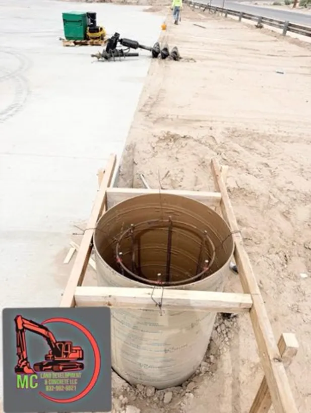 Large manhole structure set into a formed opening