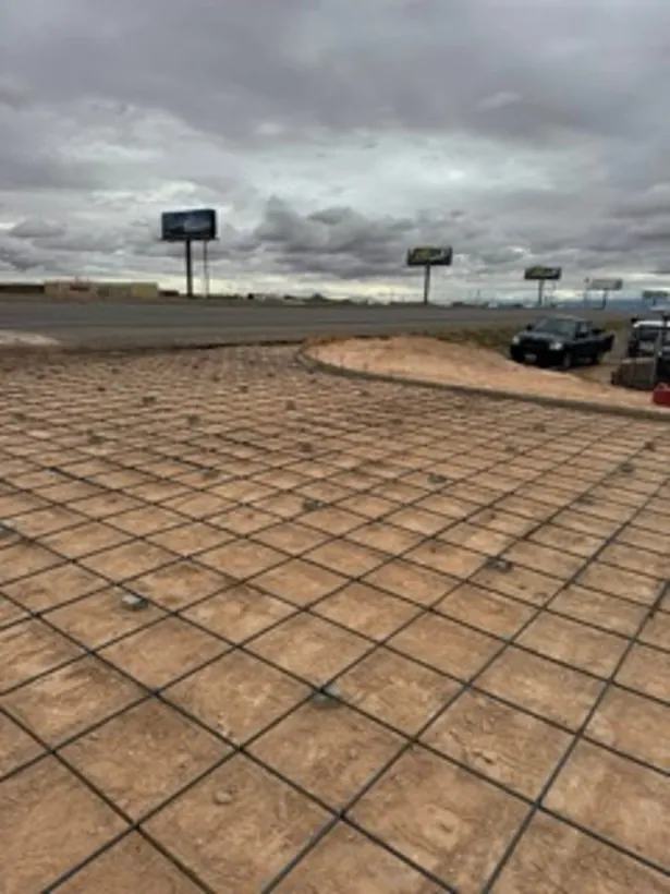 Rebar grid tied out over a large commercial pad