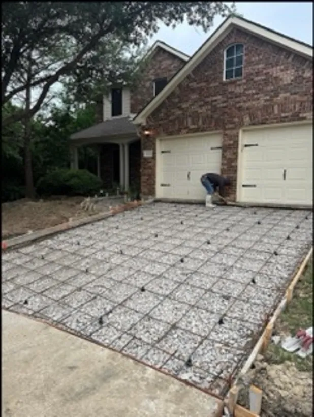 Driveway formed and reinforced with rebar before the pour