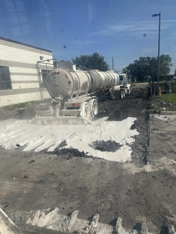 Mixer truck discharging on a prepared commercial subgrade