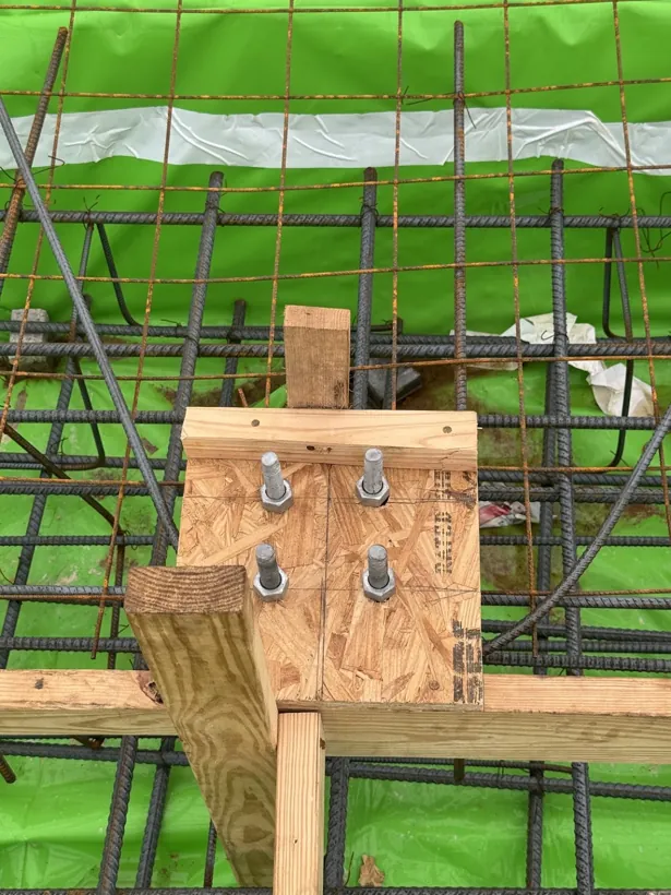 Rebar and post tension detail tied over vapor barrier before the pour