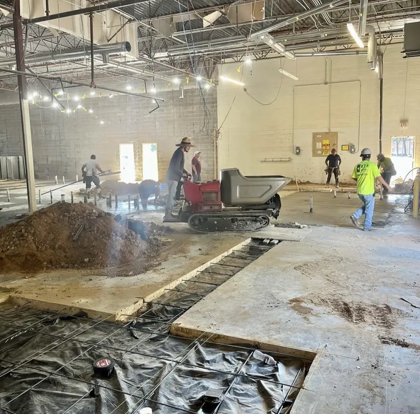 Interior tear out and repour inside an occupied commercial building