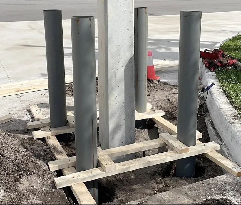 Bollards and sleeves formed and set in fresh concrete