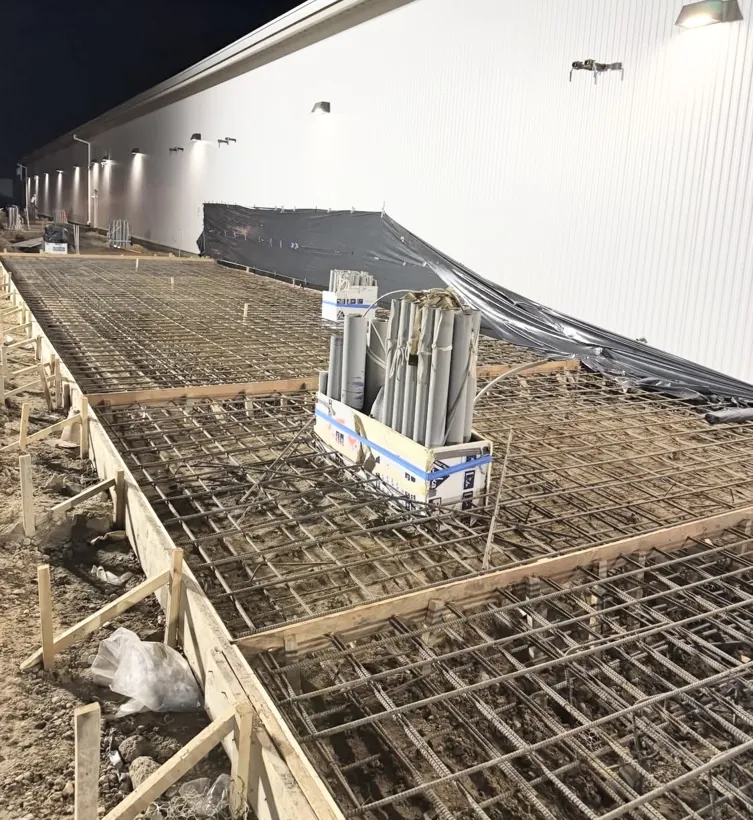 Interior rebar and column blockouts set before an inside pour